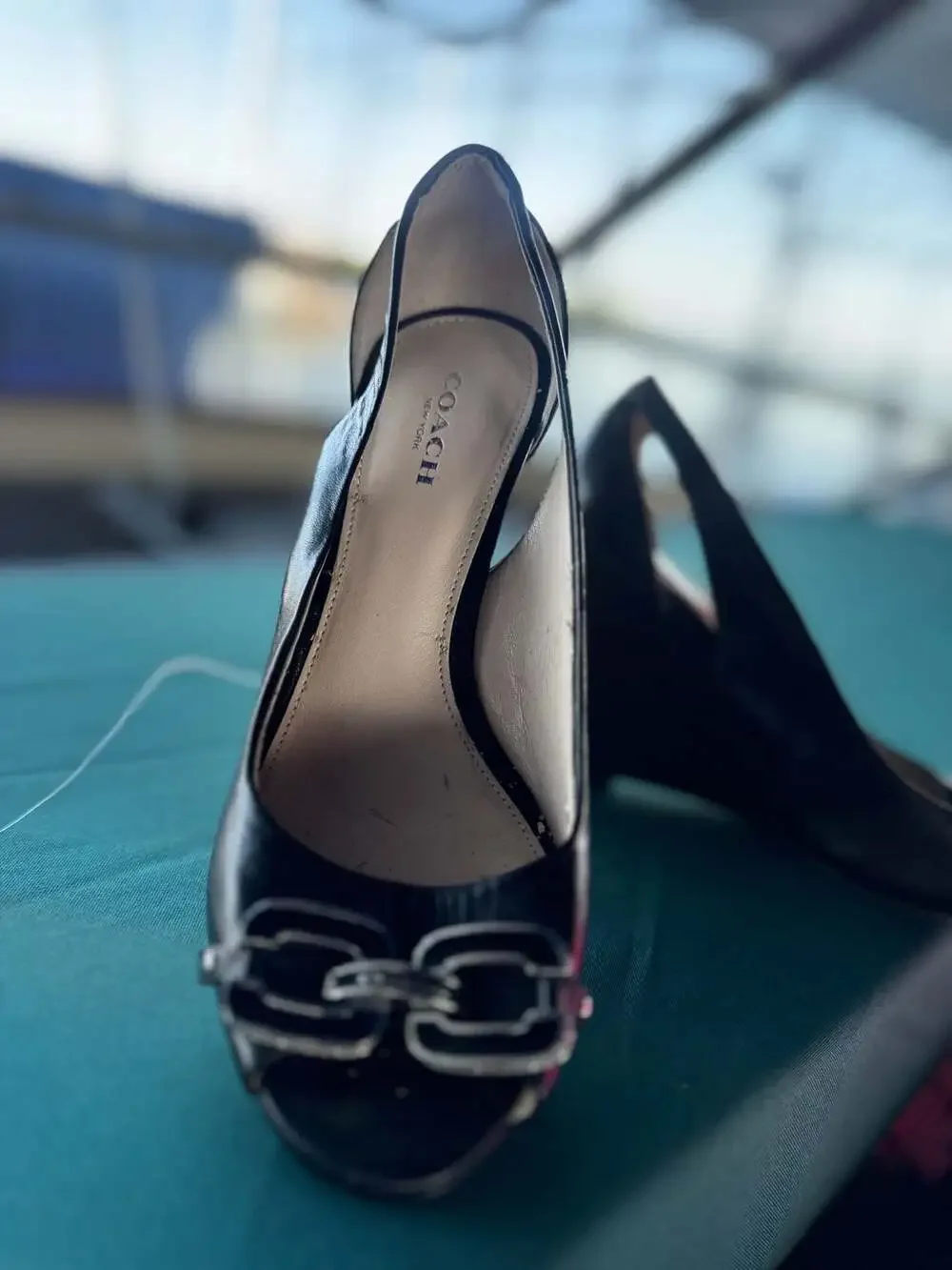 Coach peep toe, black and tan wedges w silver logo size 6